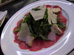 
Carpaccio served with wild arugula and shaved Parmasen cheese