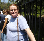 Ponchos taking pictures again? (the girl infront of her in line even looks mad...)